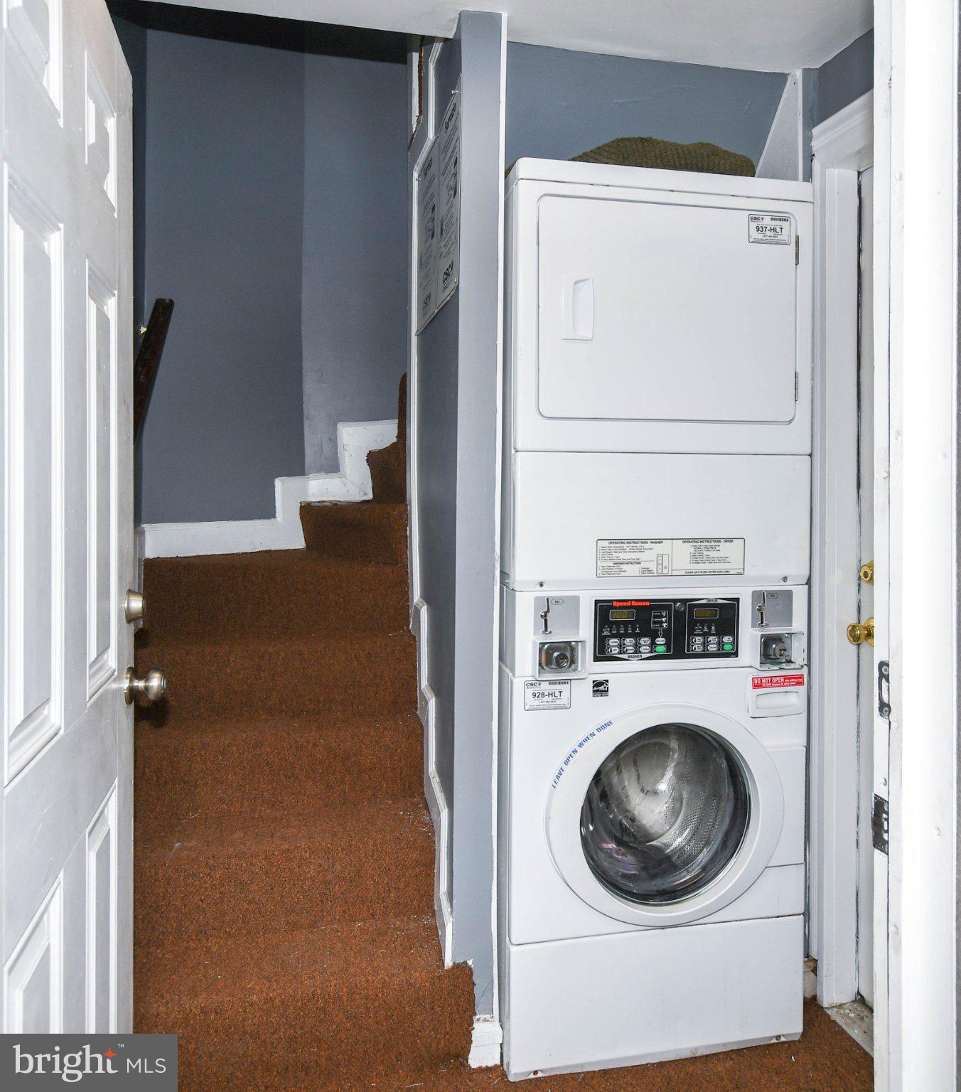 554 Newcomb Street Southeast, Unit 4 Washington, DC 20032 - Photo 17 of 20 Compact laundry nook with stairs.