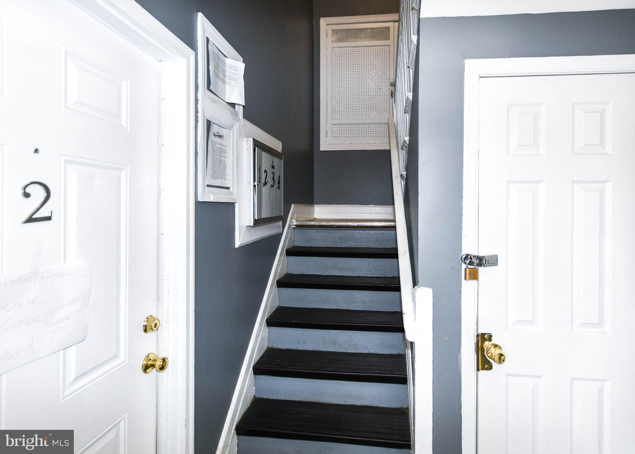 554 Newcomb Street Southeast, Unit 4 Washington, DC 20032 - Photo 18 of 20 Inviting entryway with stylish stairs.