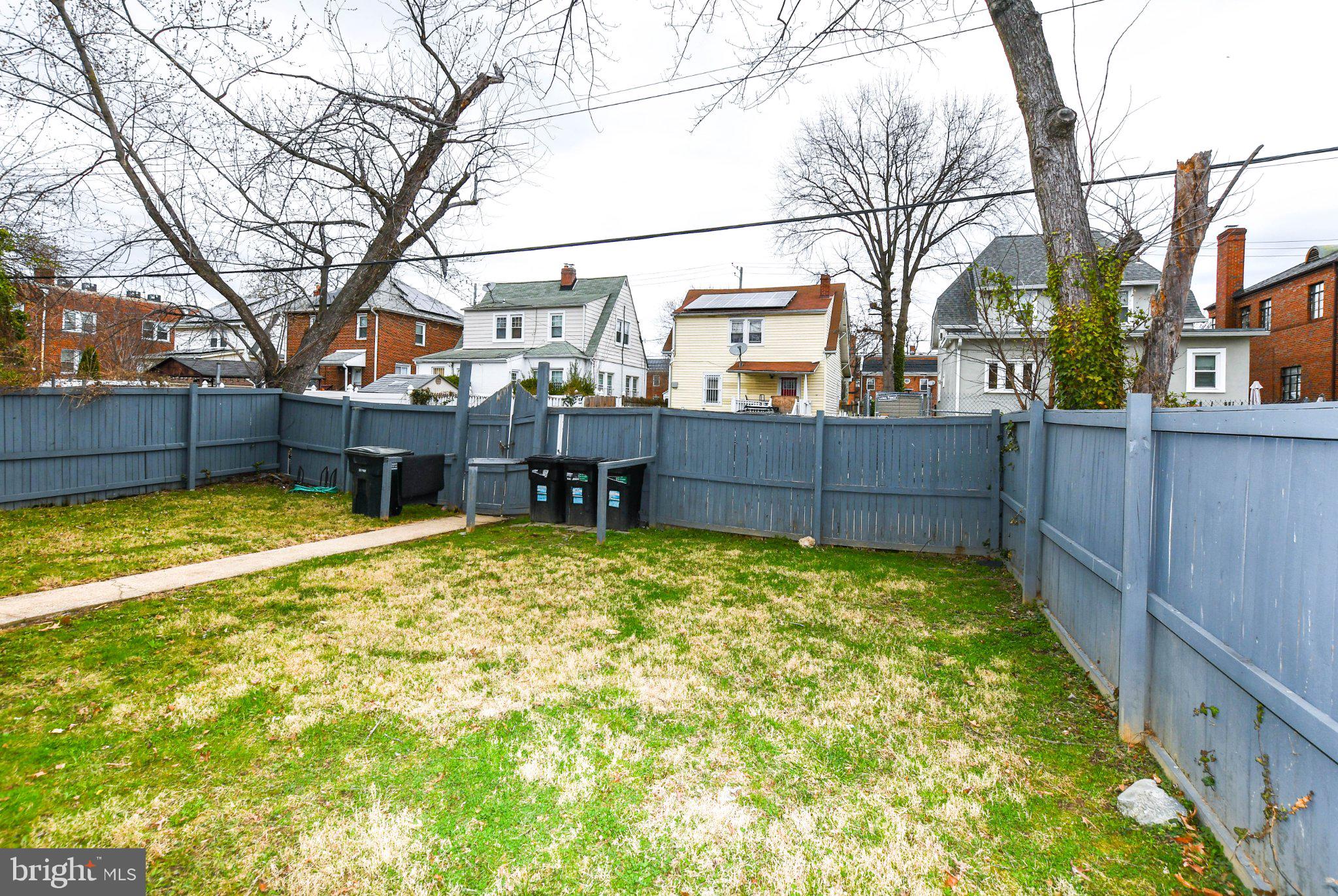 554 Newcomb Street Southeast, Unit 4 Washington, DC 20032 - Photo 20 of 20 Spacious backyard with privacy fence.