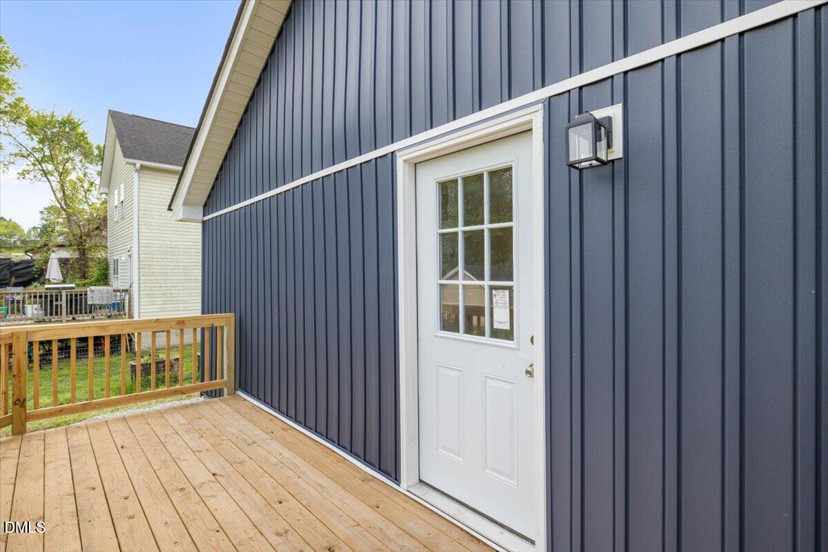 509 Sparella Street Durham, NC 27703 - Photo 28 of 30 a view of balcony with wooden floor and fence