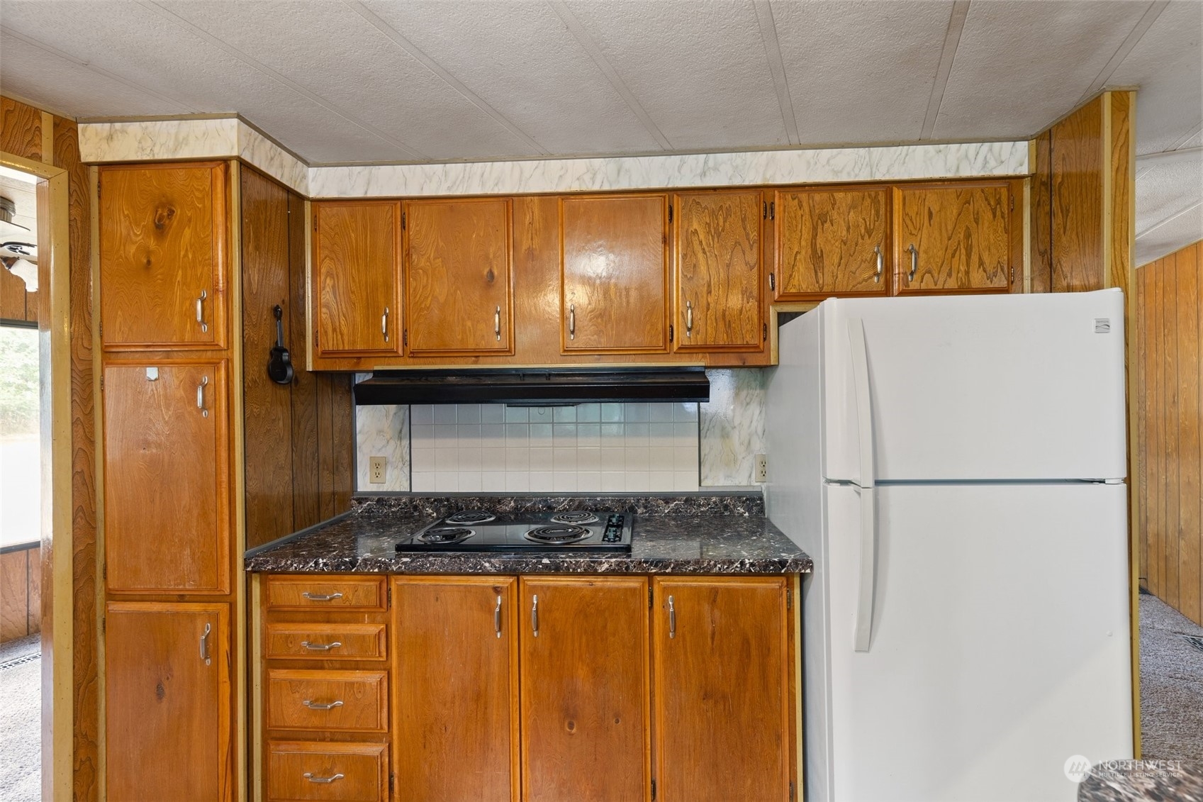 1001 Logan Hill Road Chehalis, WA 98532 - Photo 14 of 23 a white refrigerator freezer sitting in a kitchen
