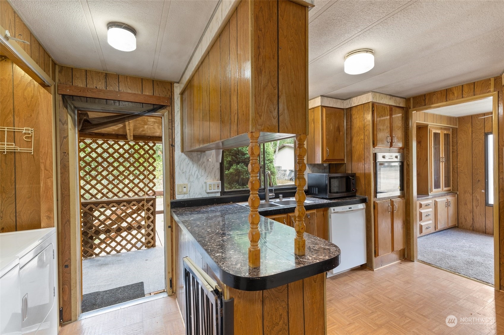 1001 Logan Hill Road Chehalis, WA 98532 - Photo 15 of 23 a kitchen with sink refrigerator and cabinets