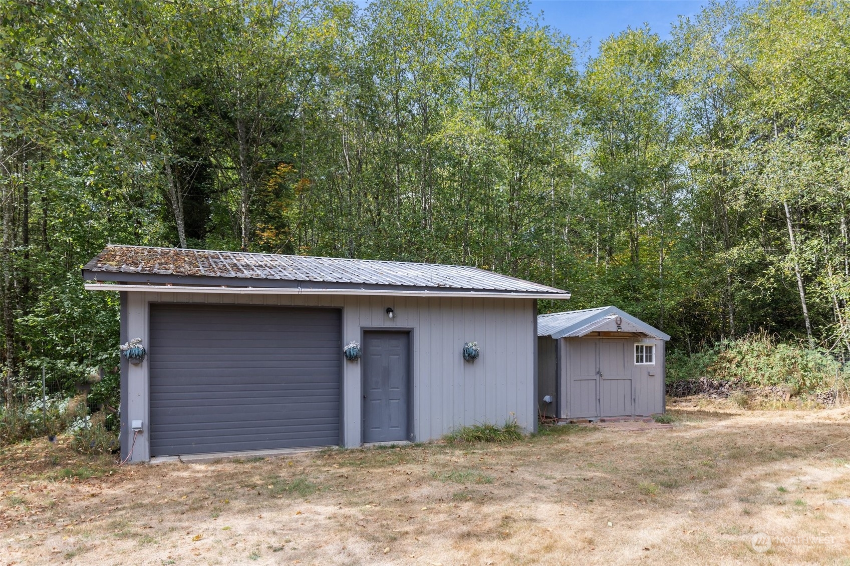 1001 Logan Hill Road Chehalis, WA 98532 - Photo 2 of 23 a house with trees in the background
