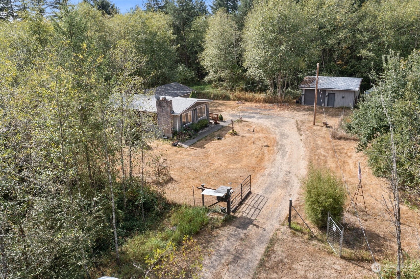 1001 Logan Hill Road Chehalis, WA 98532 - Photo 5 of 23 a view of a house with a yard