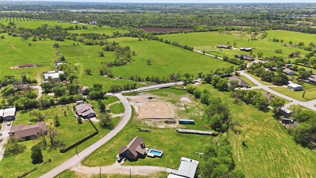 501 Rising Star Lane Sanger, TX 76266 - Photo 17 of 17 an aerial view of residential houses with outdoor space and river view