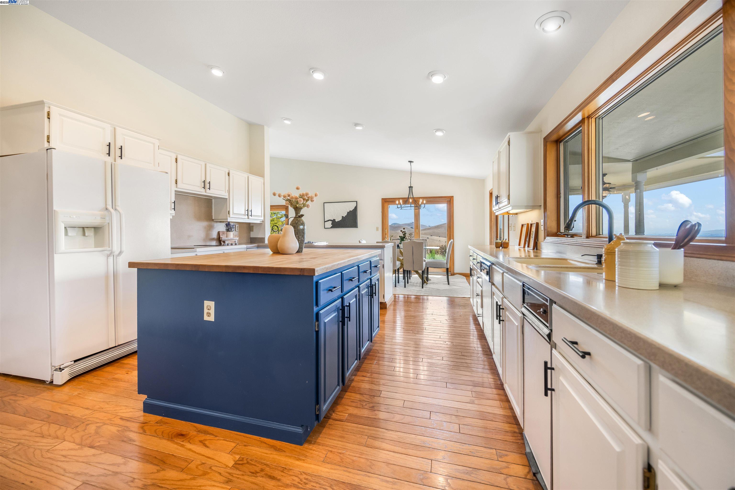 9050 Highland Road Livermore, CA 94551 - Photo 13 of 57 a kitchen with stainless steel appliances granite countertop counter space a sink a refrigerator and a counter top space