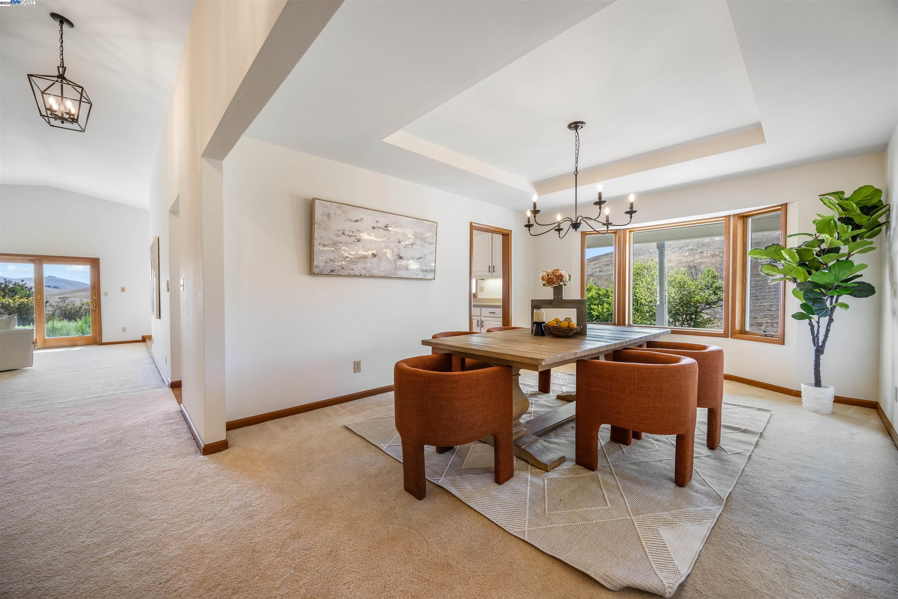 9050 Highland Road Livermore, CA 94551 - Photo 17 of 57 a dining room with furniture window and wooden floor