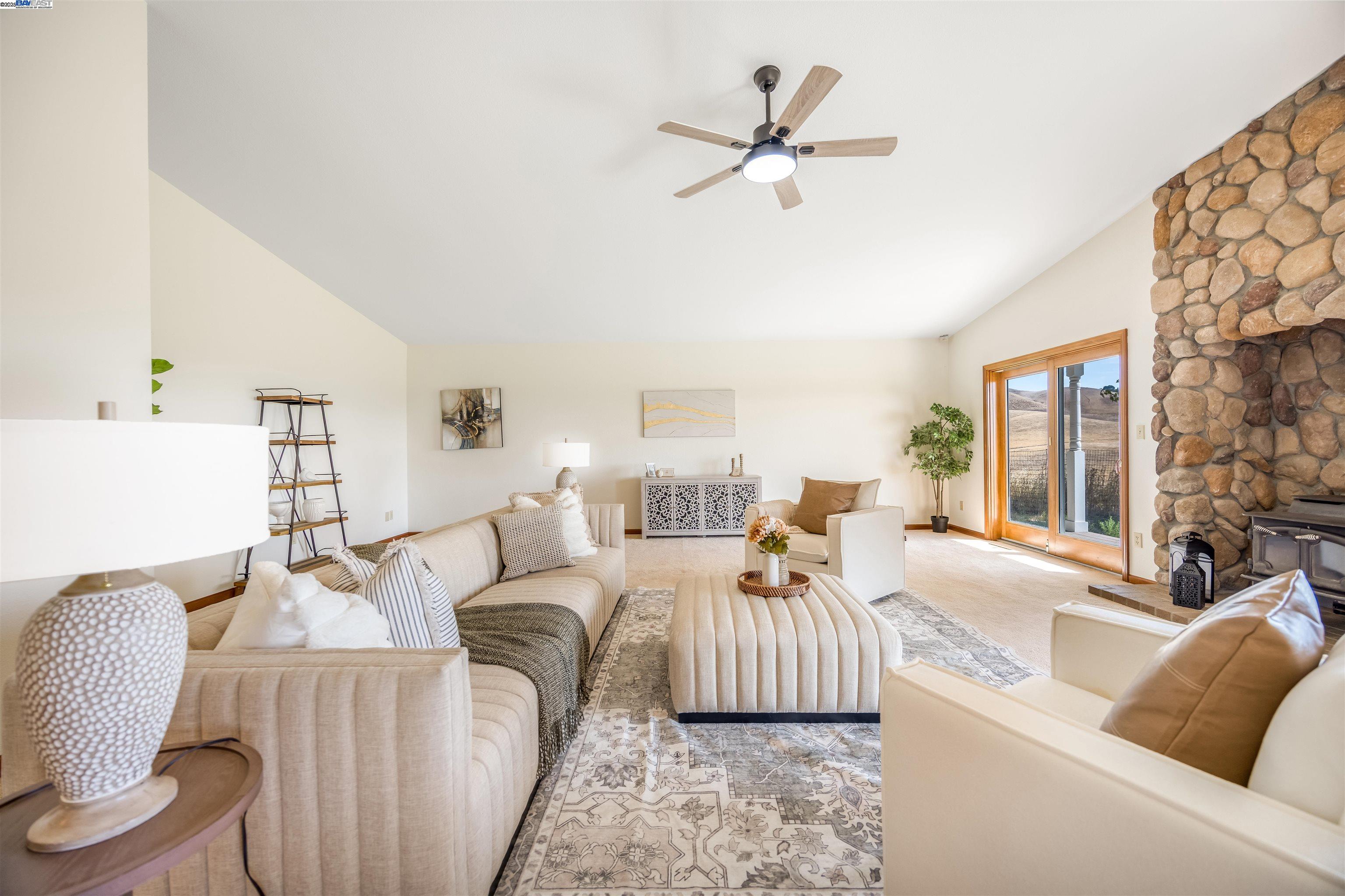9050 Highland Road Livermore, CA 94551 - Photo 23 of 57 a living room with furniture and a large window