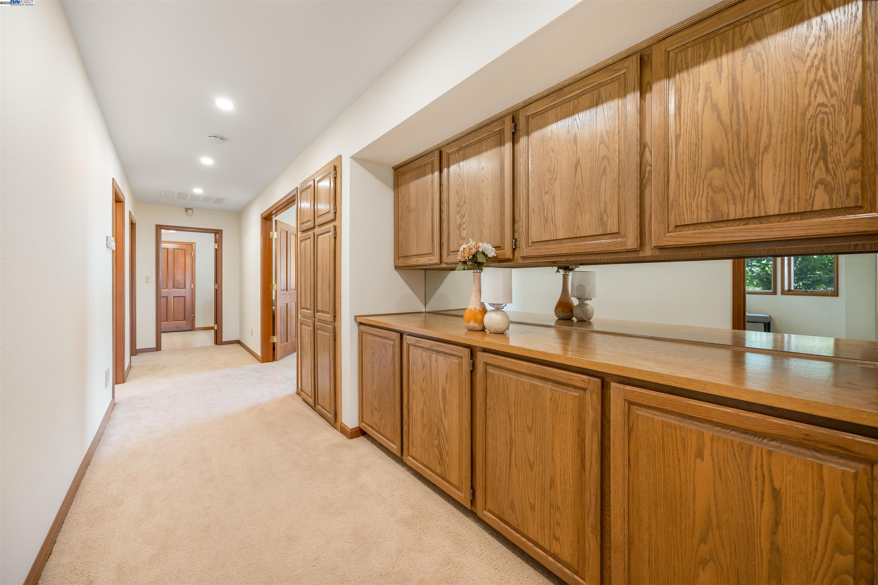 9050 Highland Road Livermore, CA 94551 - Photo 24 of 57 a kitchen with granite countertop wooden cabinets a sink and dishwasher