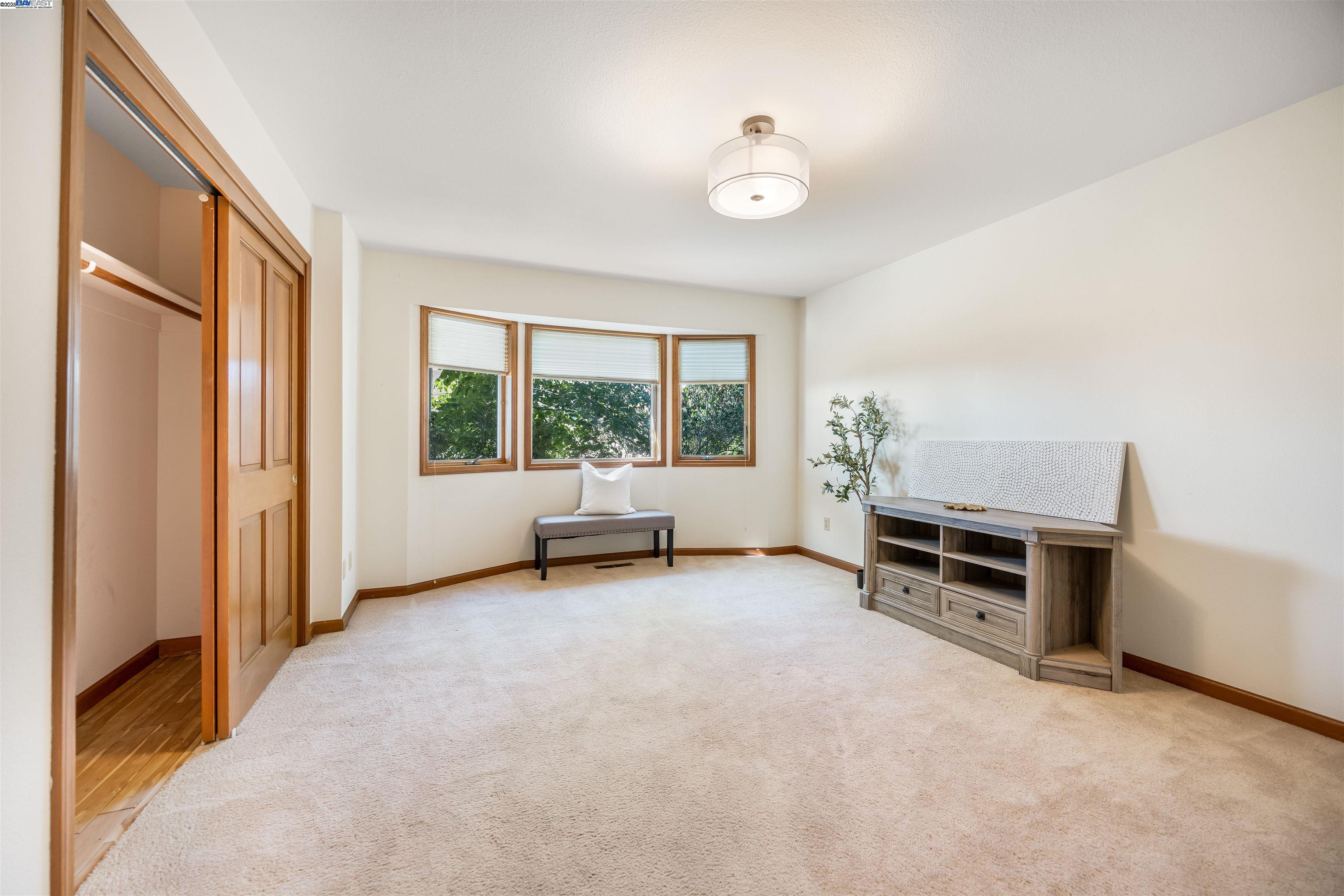 9050 Highland Road Livermore, CA 94551 - Photo 27 of 57 an empty room with furniture and a window