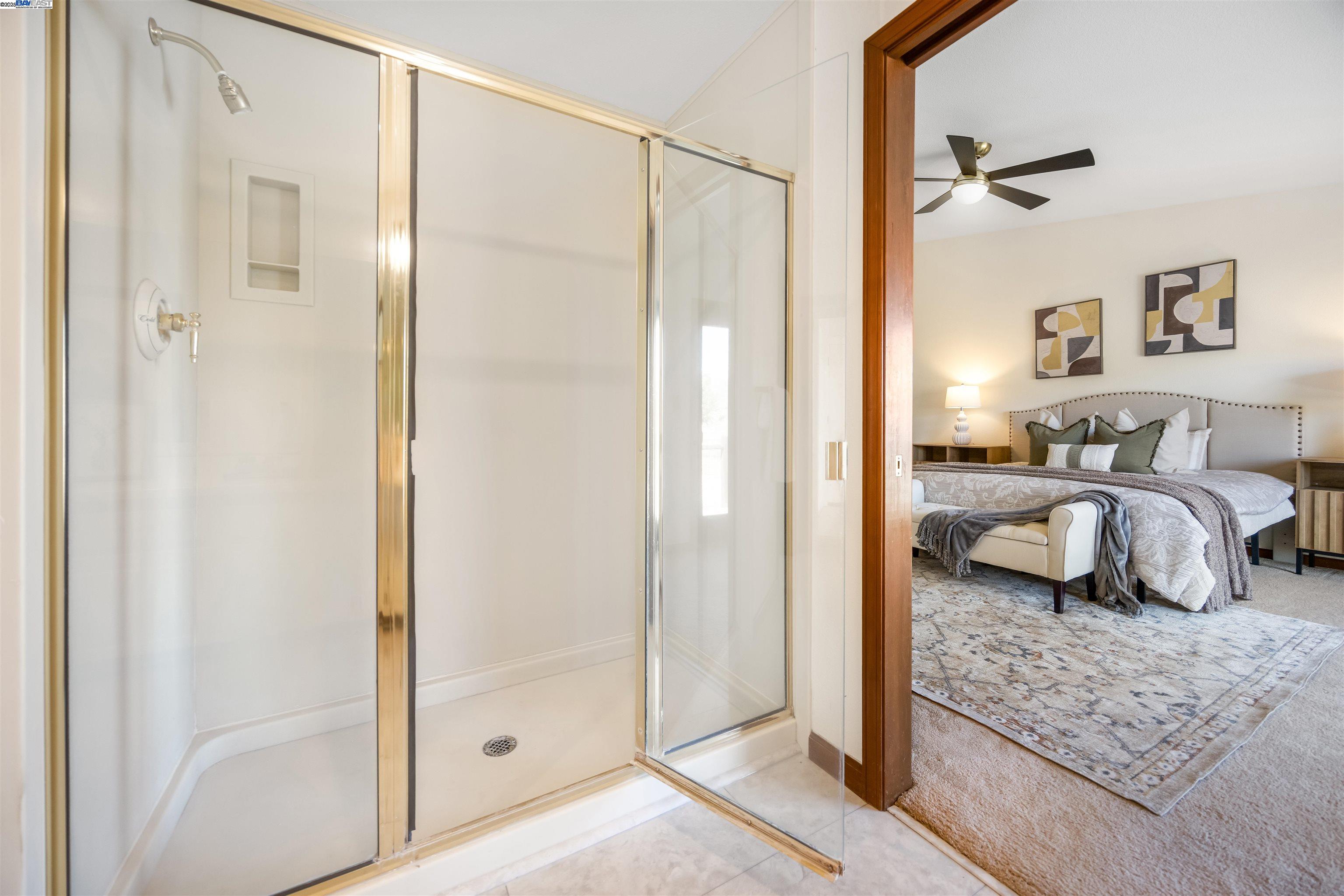 9050 Highland Road Livermore, CA 94551 - Photo 32 of 57 a bedroom with a bed and a walk in closet