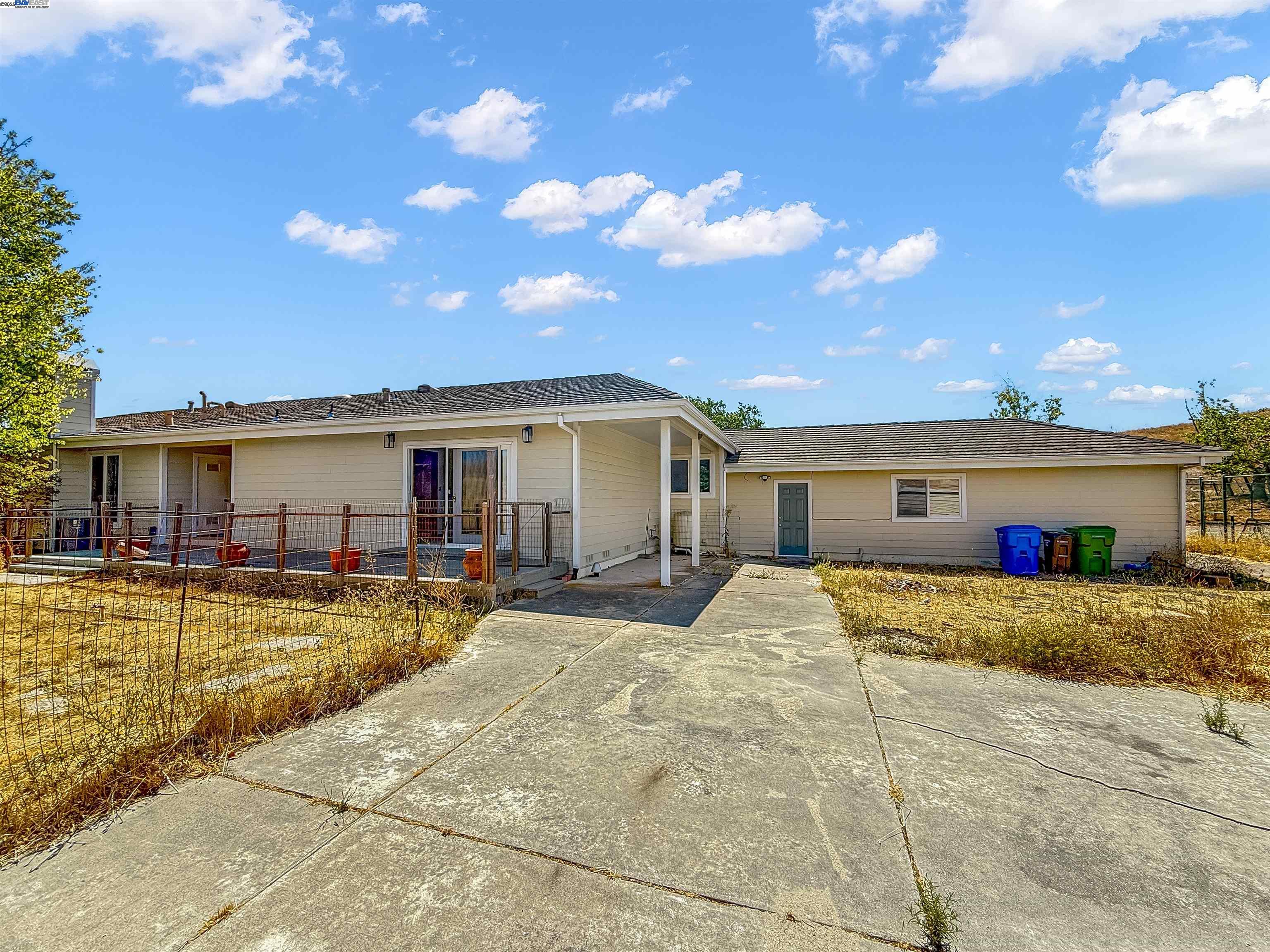9050 Highland Road Livermore, CA 94551 - Photo 45 of 57 a view of a house with swimming pool and sitting area