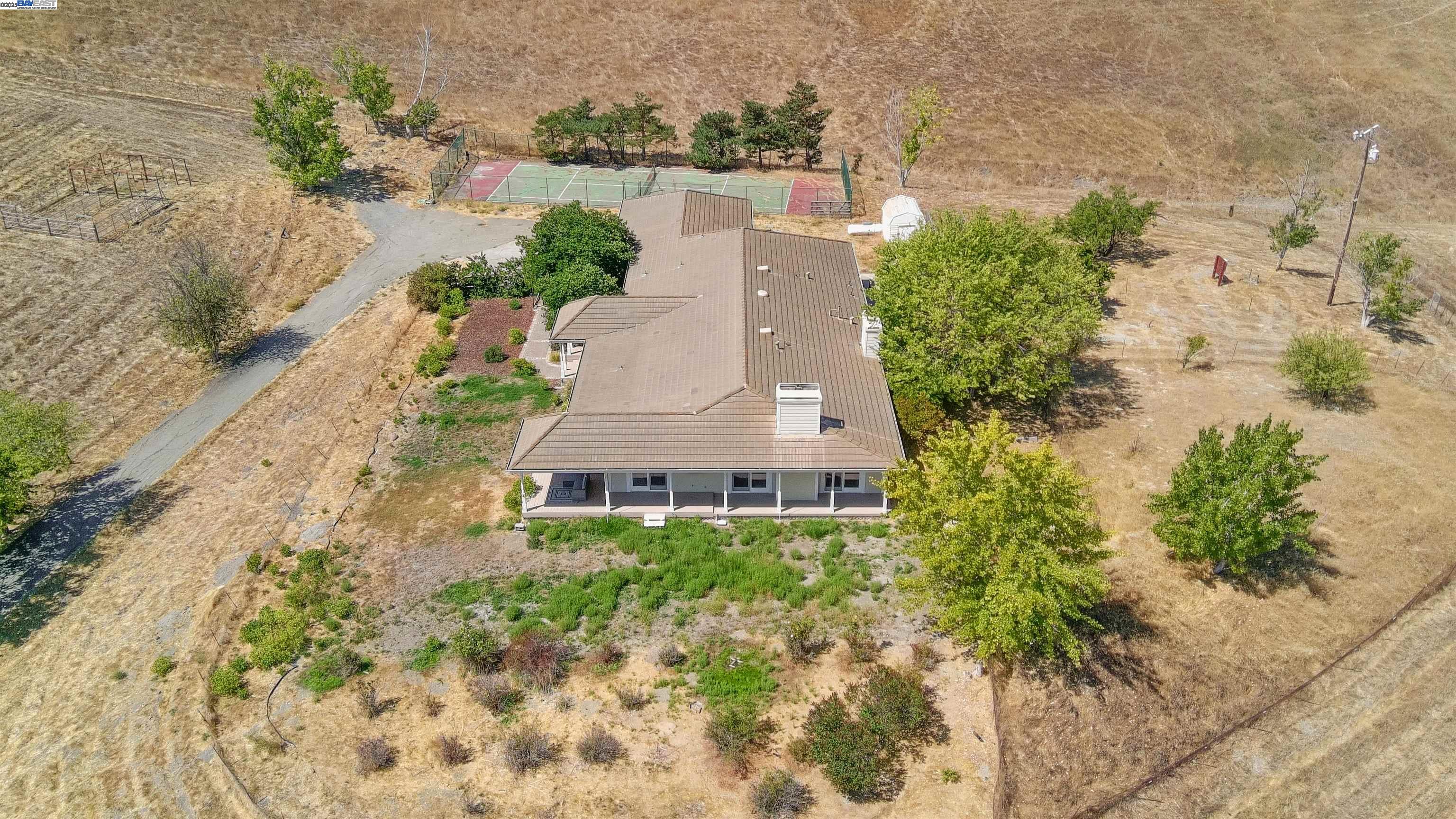 9050 Highland Road Livermore, CA 94551 - Photo 54 of 57 an aerial view of a house with yard and lake view