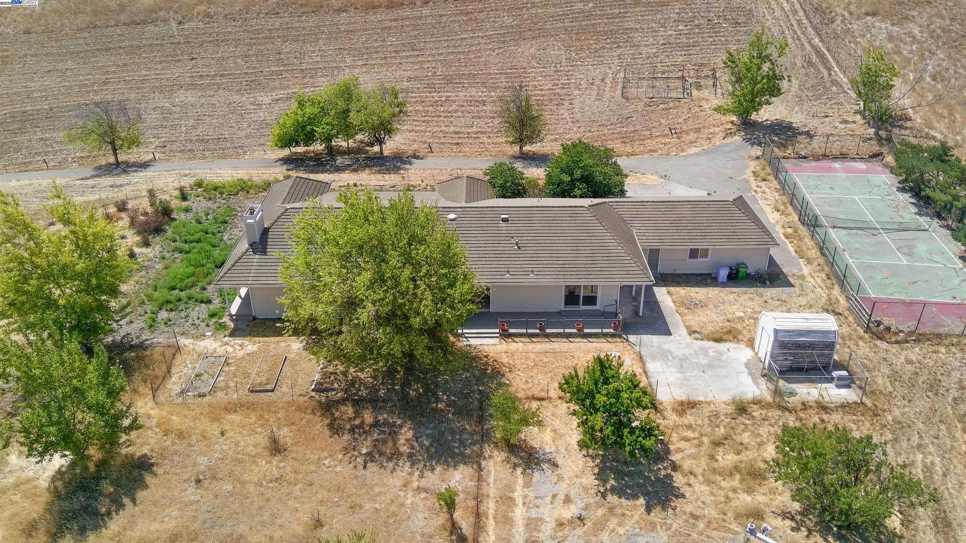 9050 Highland Road Livermore, CA 94551 - Photo 55 of 57 an aerial view of a house with a yard