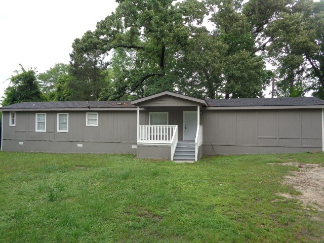 15120 Capitol Hill Road Montgomery, TX 77316 - Photo 2 of 17 a house that has tree in front of it