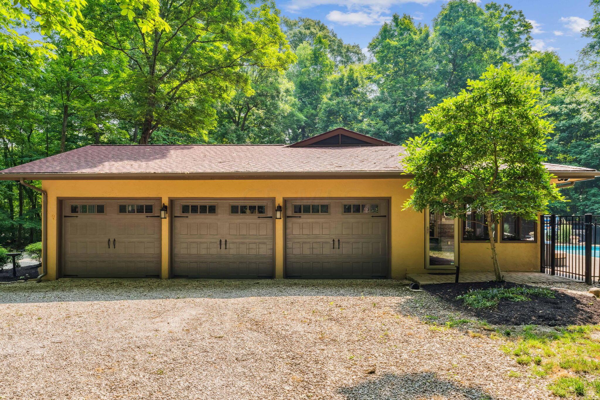 2423 Carriage Road Powell, OH 43065 - Photo 66 of 100 3 Car Attached Garage