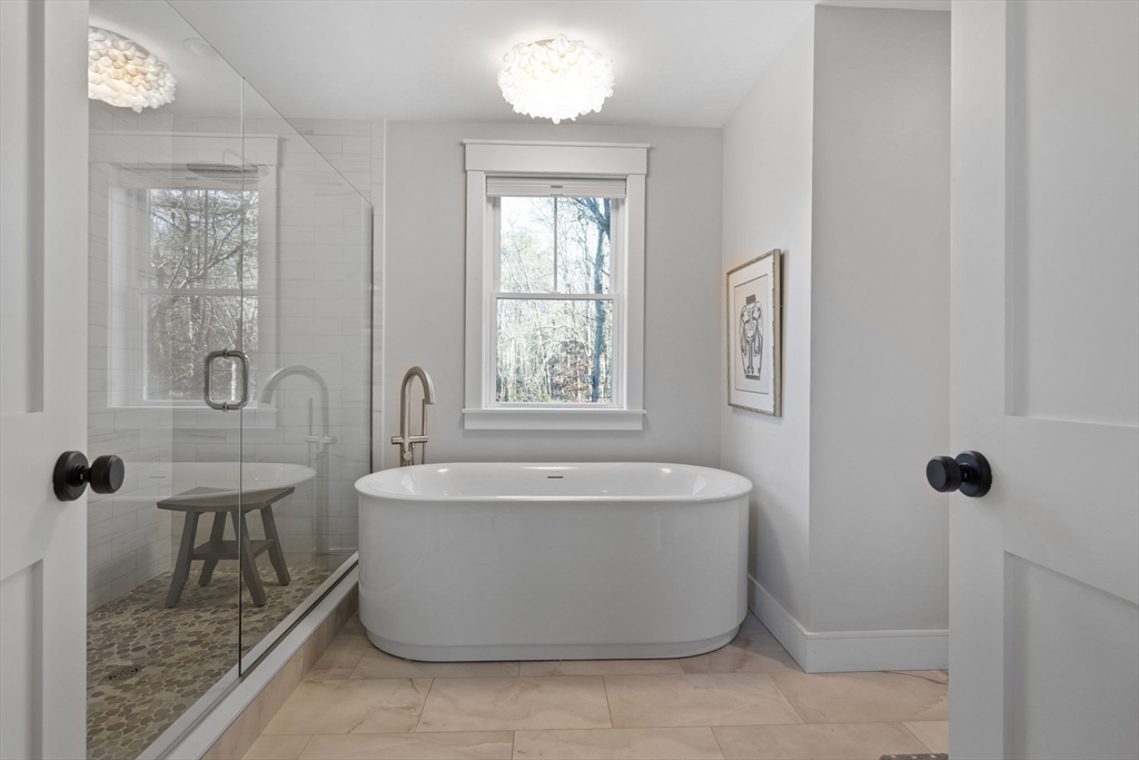 35 East Street Middleton, MA 01949 - Photo 20 of 42 a view of a bathtub in a bathroom