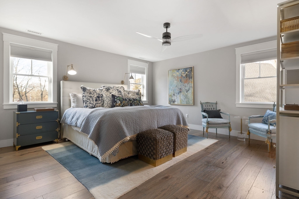 35 East Street Middleton, MA 01949 - Photo 27 of 42 a bedroom with a bed and wooden floor