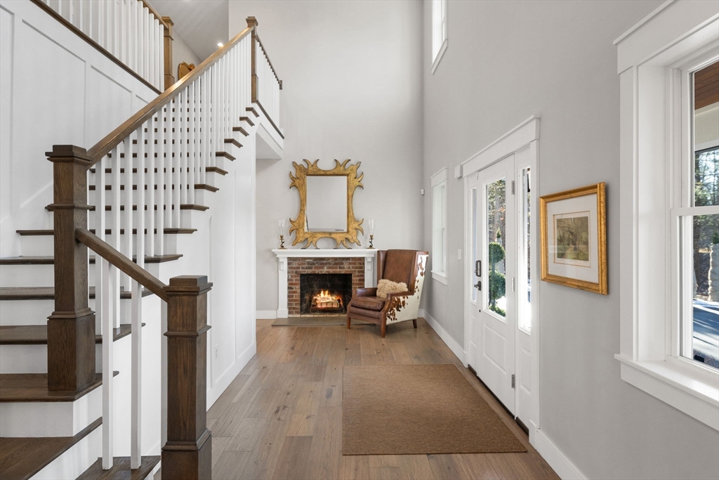 35 East Street Middleton, MA 01949 - Photo 3 of 42 a view of entryway and hall with wooden floor