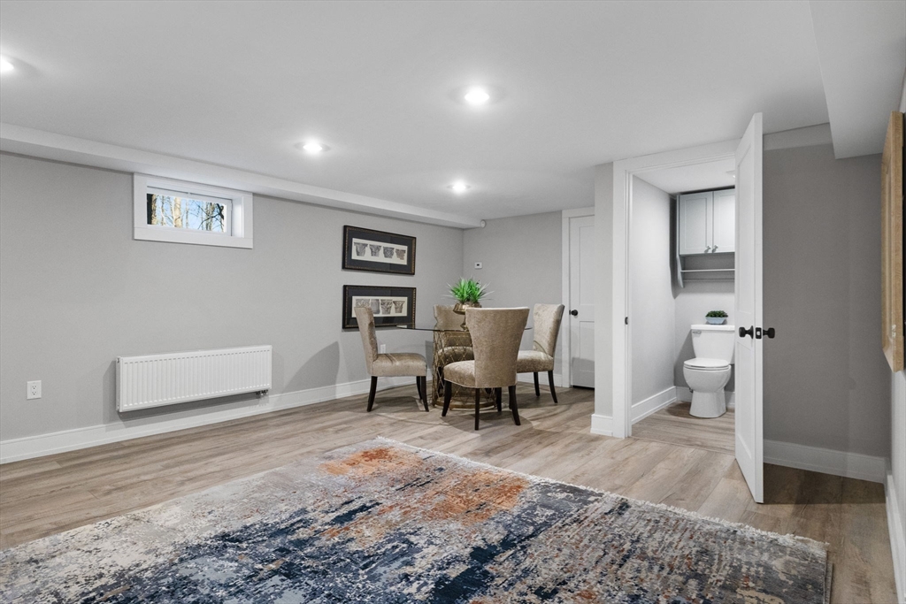 35 East Street Middleton, MA 01949 - Photo 31 of 42 a living room with furniture and a rug