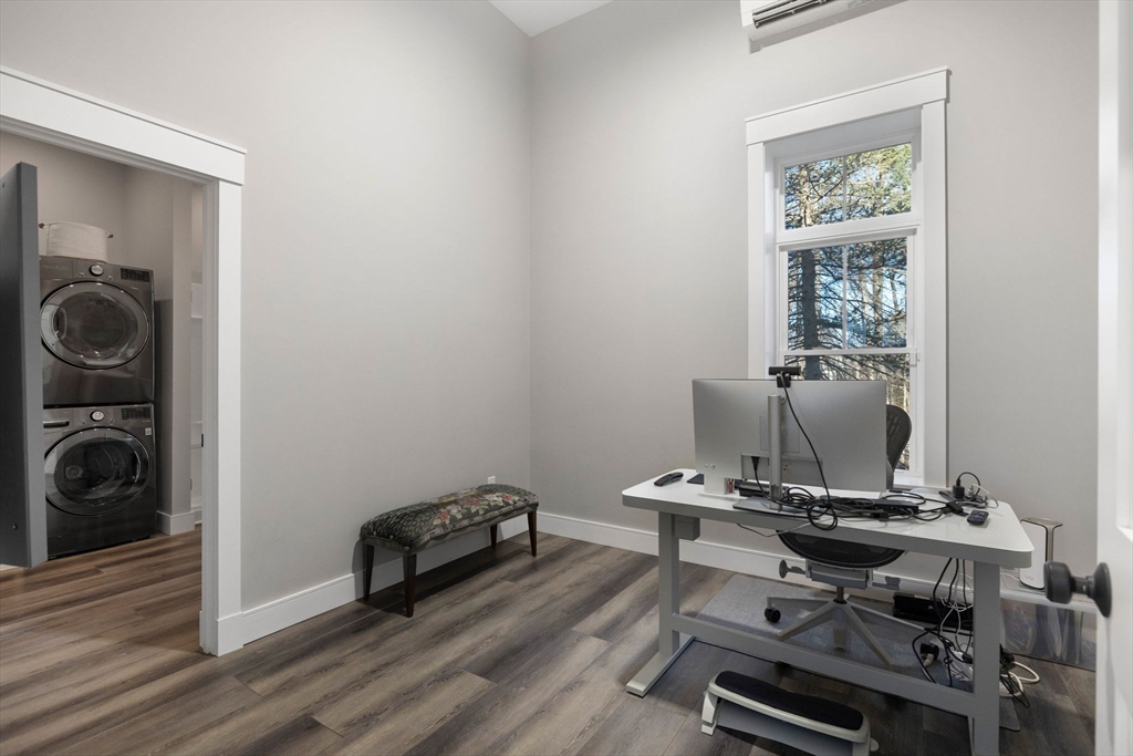35 East Street Middleton, MA 01949 - Photo 35 of 42 a view of a workspace with furniture and a window