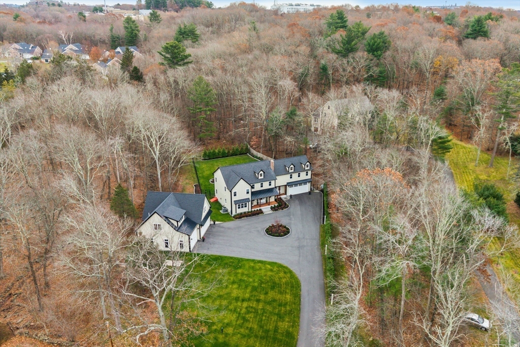 35 East Street Middleton, MA 01949 - Photo 40 of 42 an aerial view of a house with a yard and lake view