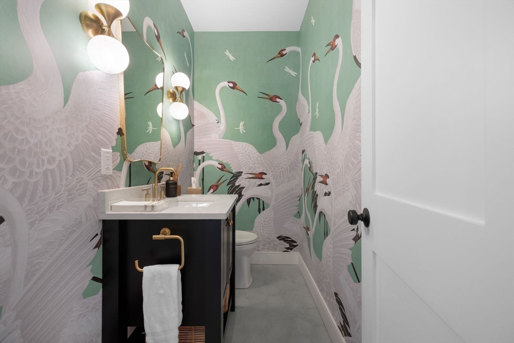 35 East Street Middleton, MA 01949 - Photo 10 of 42 a bathroom with a sink mirror and vanity