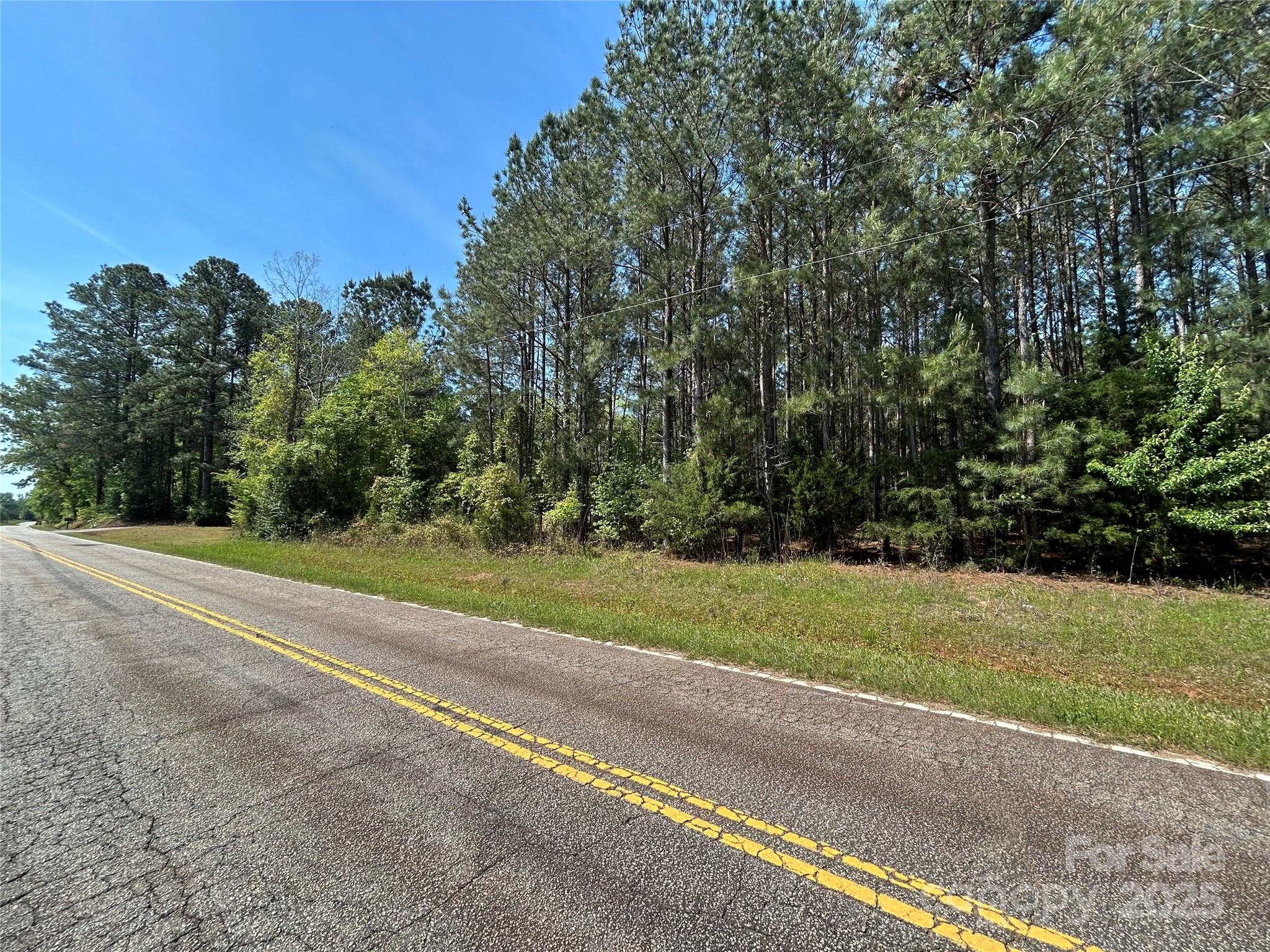 0 Hightower Road Fort Lawn, SC 29714 - Photo 1 of 6 a view of a field with trees in background