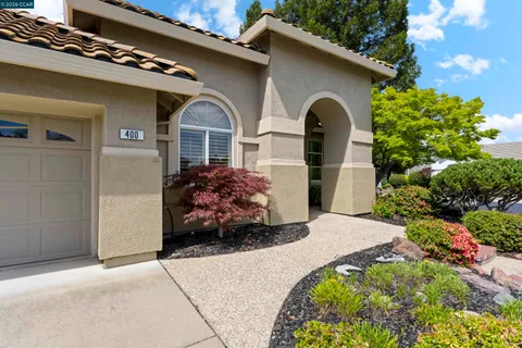 a front view of a house with a glass door