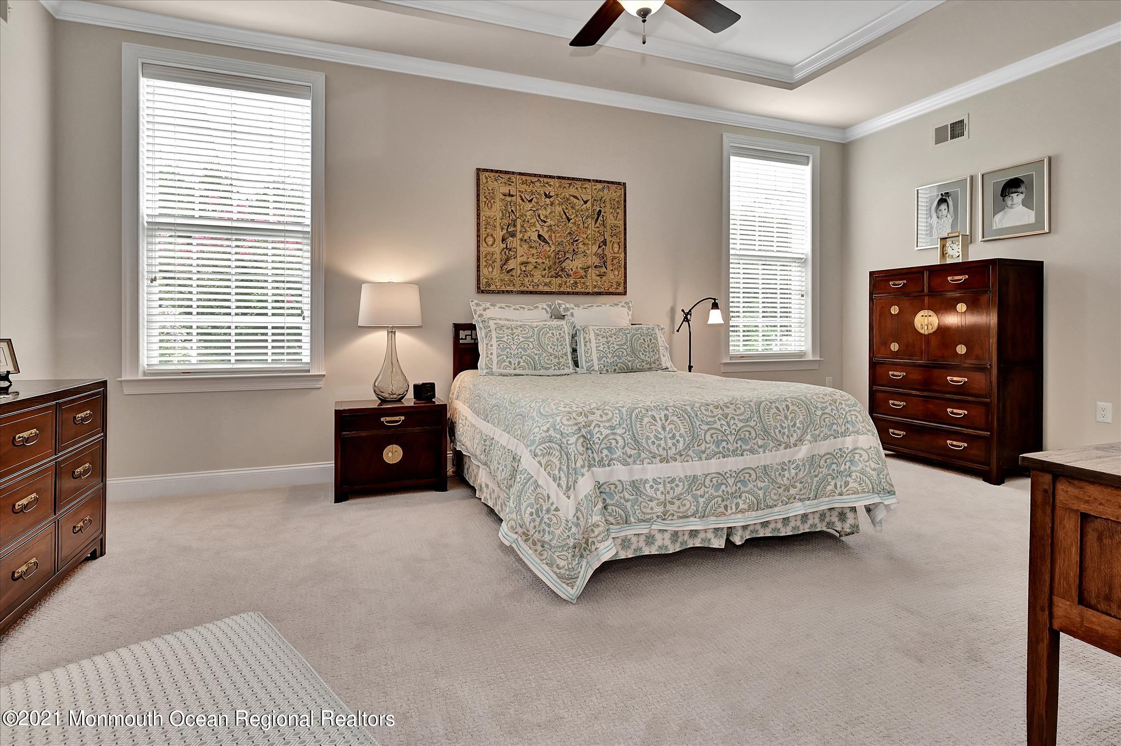 121 Sunset Drive Tinton Falls, NJ 07724 - Photo 15 of 40 a bedroom with a bed and a window