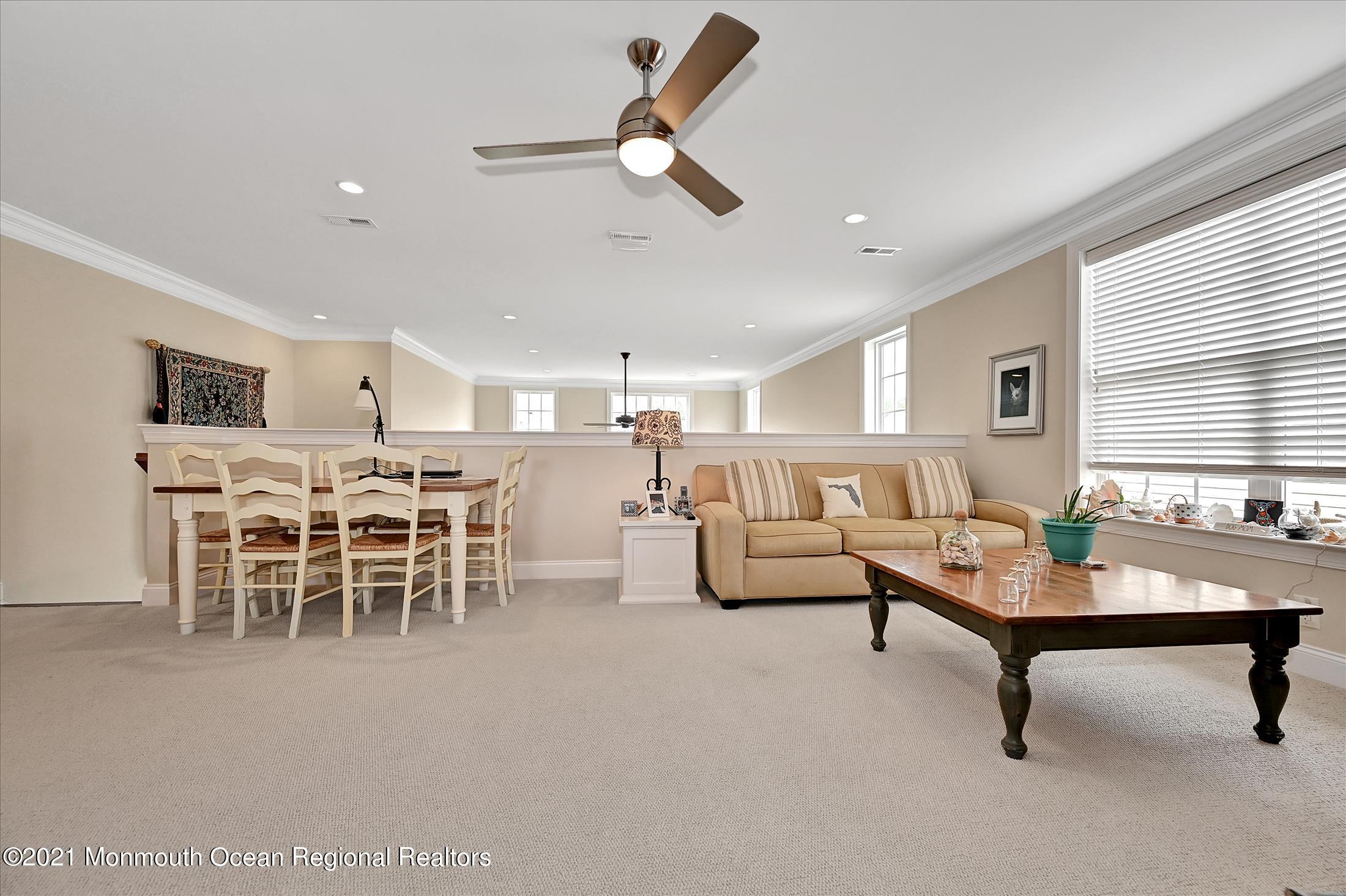 121 Sunset Drive Tinton Falls, NJ 07724 - Photo 23 of 40 a living room with furniture