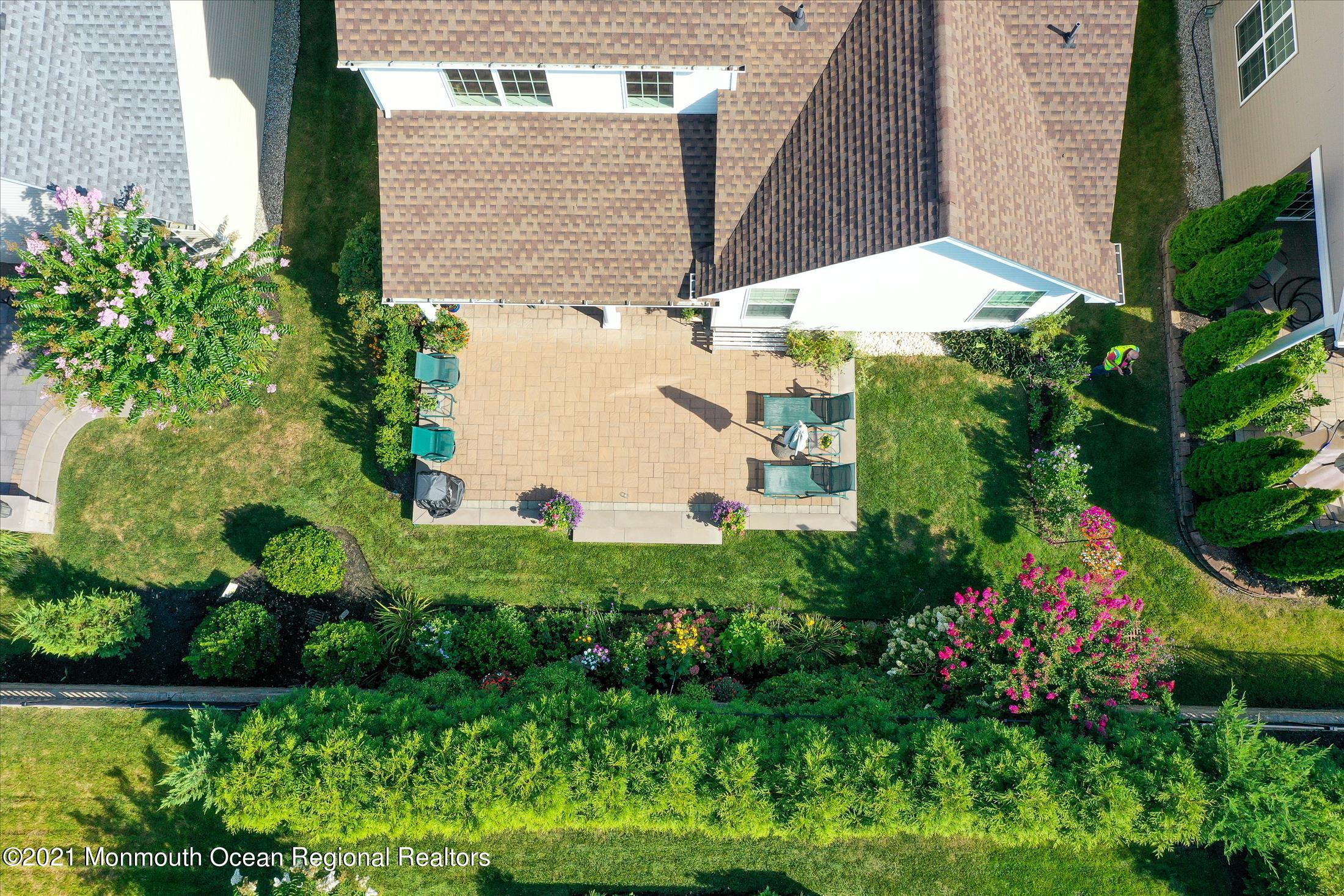 121 Sunset Drive Tinton Falls, NJ 07724 - Photo 29 of 40 a view of a backyard with plants