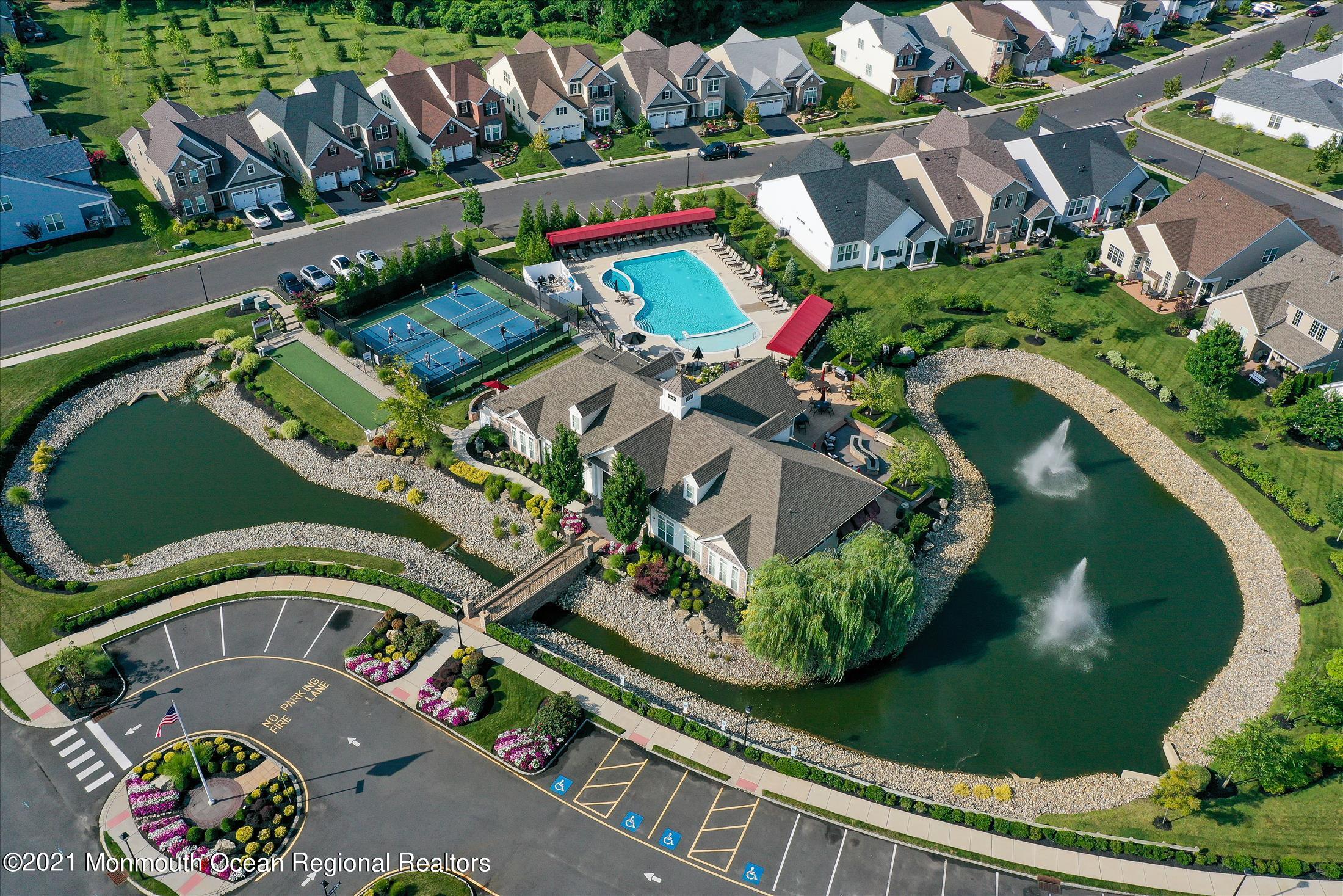 121 Sunset Drive Tinton Falls, NJ 07724 - Photo 39 of 40 an aerial view of a house a garden and mountain view in back