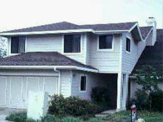 4025 Primavera Road, Unit B Santa Barbara, CA 93110 - Photo 2 of 2 a front view of a house with plants