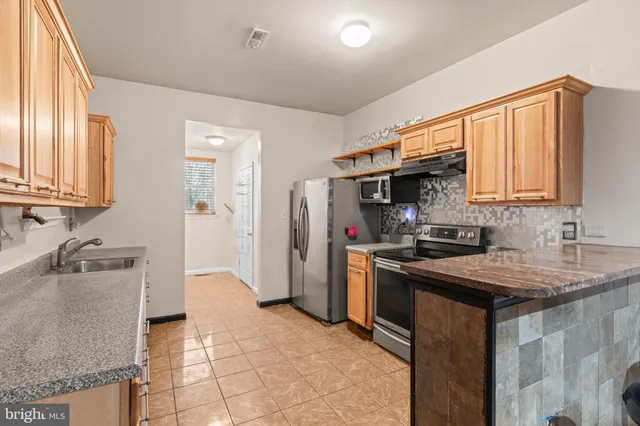 a view of a hallway with windows