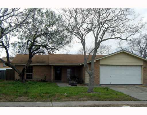 1003 Espana Drive Portland, TX 78374 - Photo 1 of 1 a view of a yard in front of a house with large tree