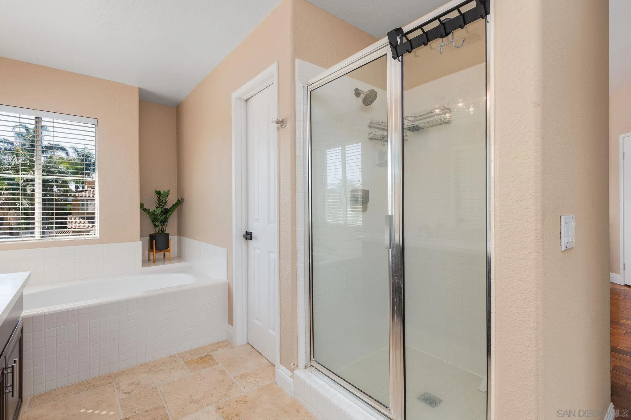 4532 Avenida Privado Oceanside, CA 92057 - Photo 23 of 40 a bathroom with a shower and a tub