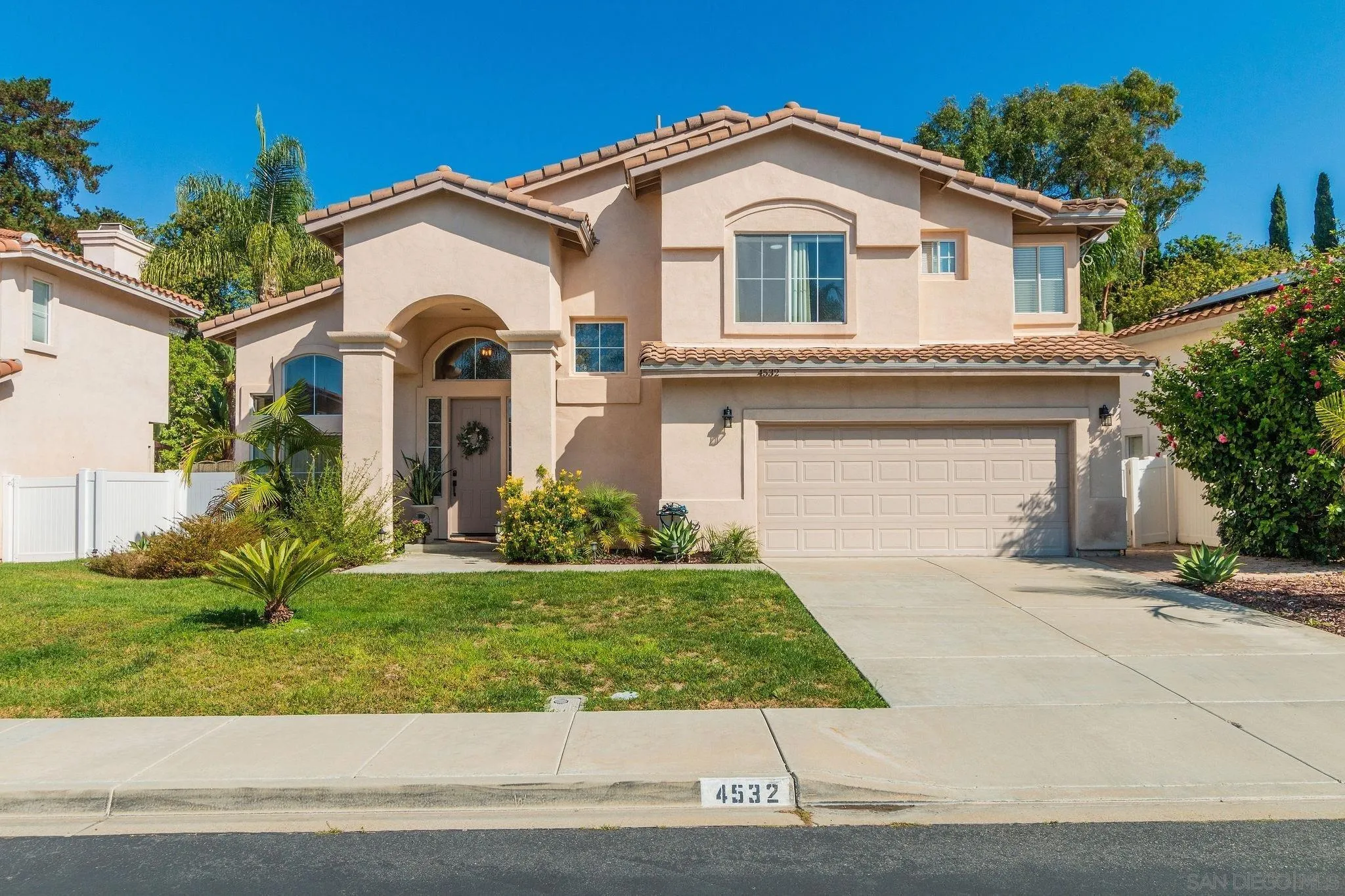 4532 Avenida Privado Oceanside, CA 92057 - Photo 3 of 40 a front view of a house with a yard