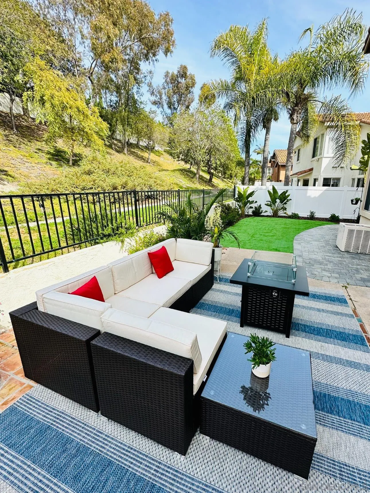 4532 Avenida Privado Oceanside, CA 92057 - Photo 31 of 40 a view of a deck with couches table and chairs and potted plants