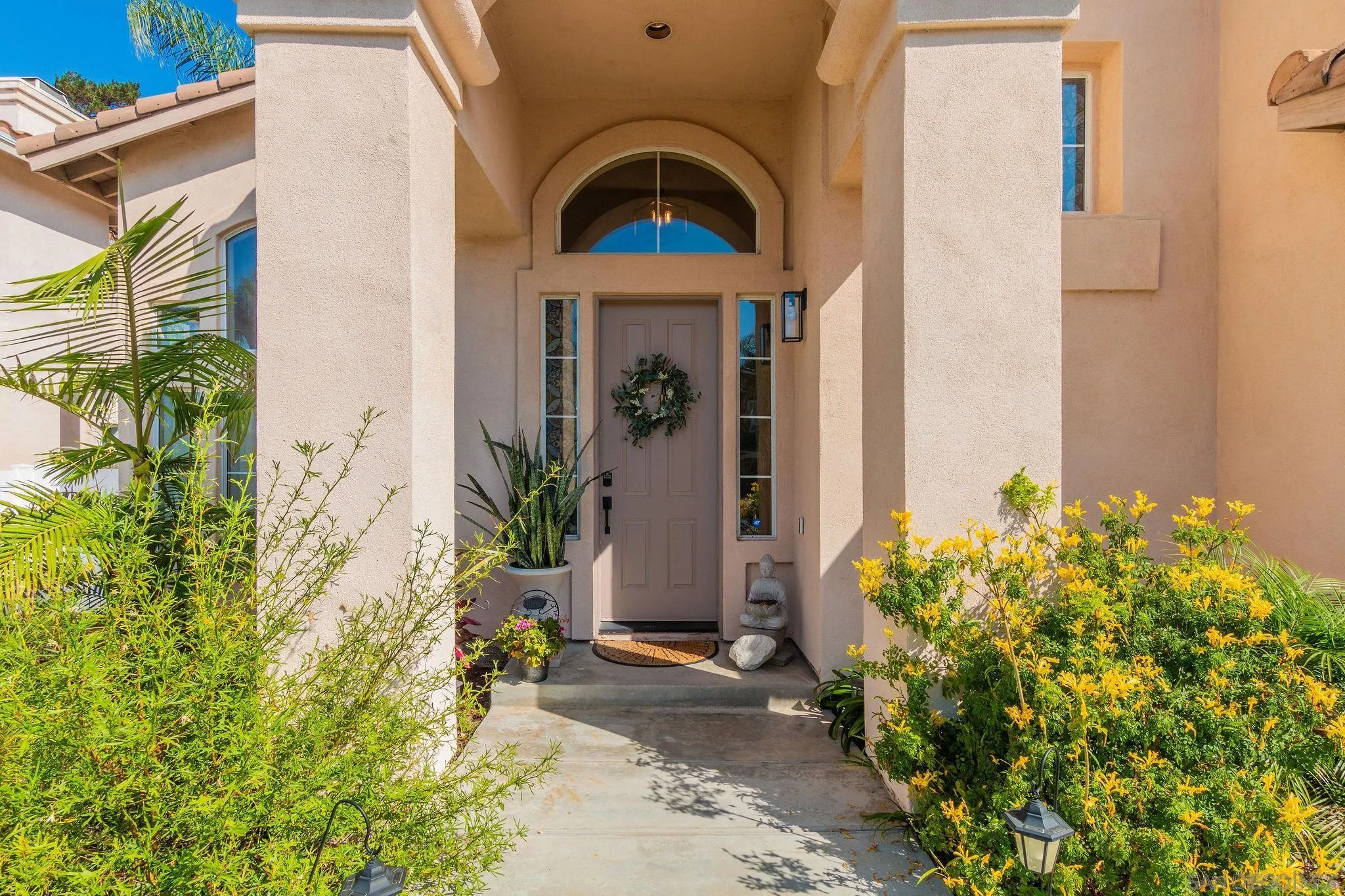 4532 Avenida Privado Oceanside, CA 92057 - Photo 4 of 40 a front view of a house with a yard