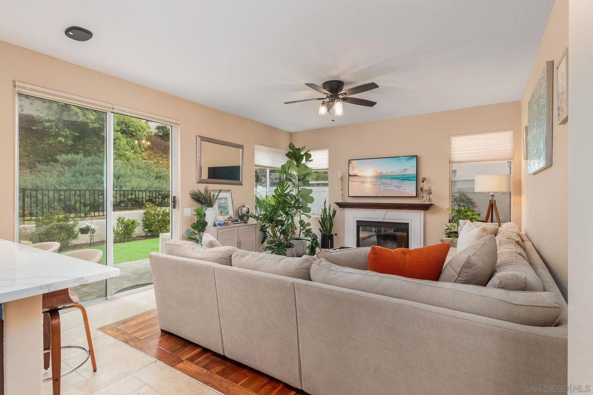 4532 Avenida Privado Oceanside, CA 92057 - Photo 9 of 40 a living room with fireplace furniture and a large window