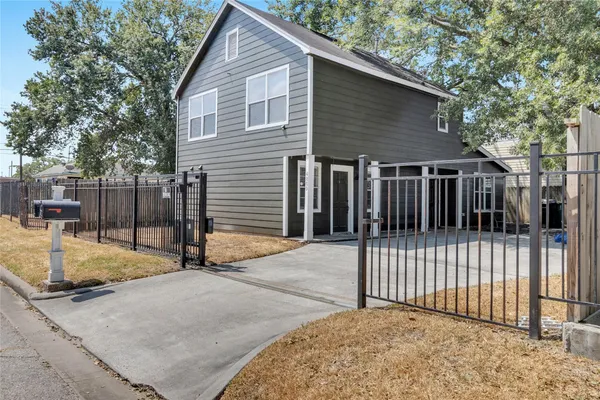 a front view of a house with a garage