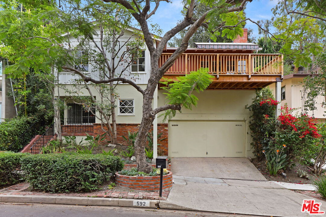 592 Dryad Road Santa Monica, CA 90402 - Photo 1 of 49 a front view of a house with plants