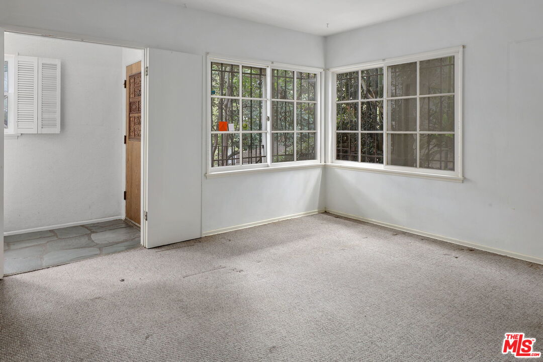 592 Dryad Road Santa Monica, CA 90402 - Photo 6 of 49 an empty room with windows