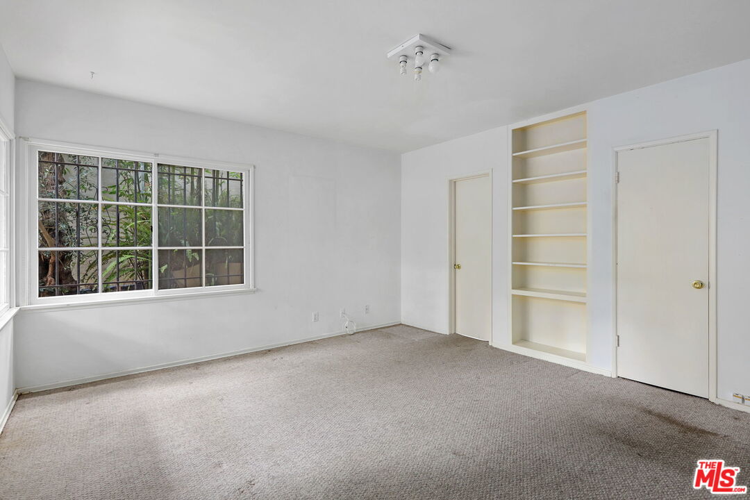 592 Dryad Road Santa Monica, CA 90402 - Photo 7 of 49 a view of an empty room with a window
