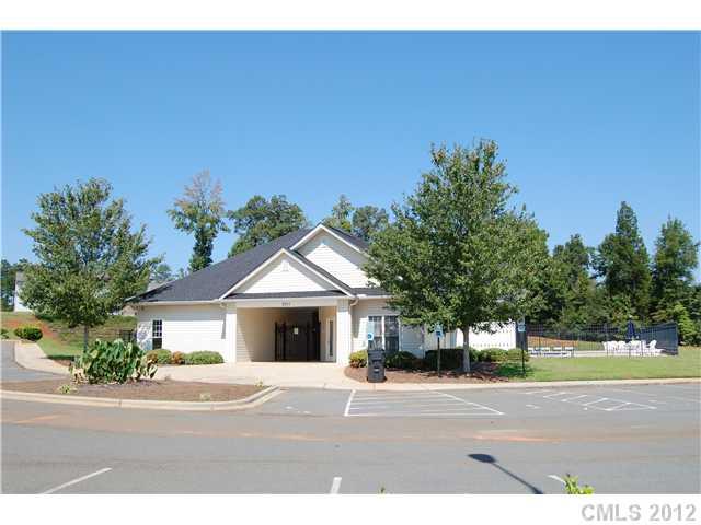 10529 Gold Pan Road Charlotte, NC 28215 - Photo 12 of 13 a front view of a house with a yard and garage