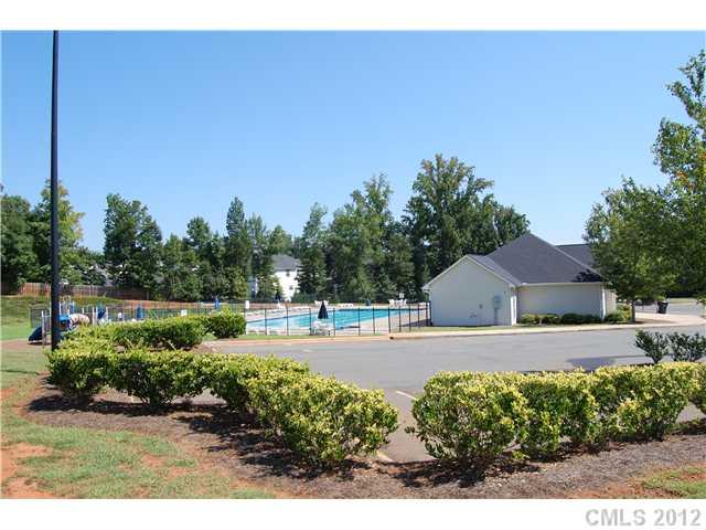 10529 Gold Pan Road Charlotte, NC 28215 - Photo 13 of 13 a front view of a house with a yard