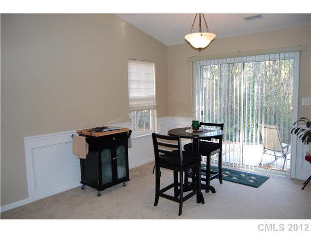 10529 Gold Pan Road Charlotte, NC 28215 - Photo 3 of 13 a dining room with furniture and window