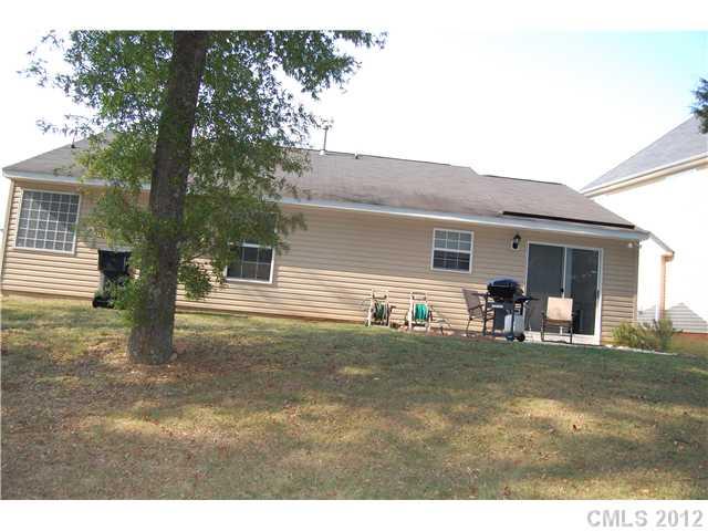 10529 Gold Pan Road Charlotte, NC 28215 - Photo 9 of 13 a view of a house with backyard