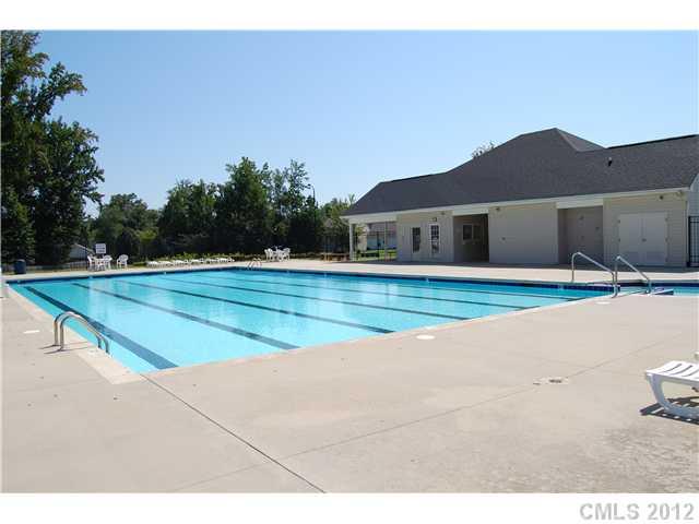 10529 Gold Pan Road Charlotte, NC 28215 - Photo 10 of 13 a view of swimming pool with a yard